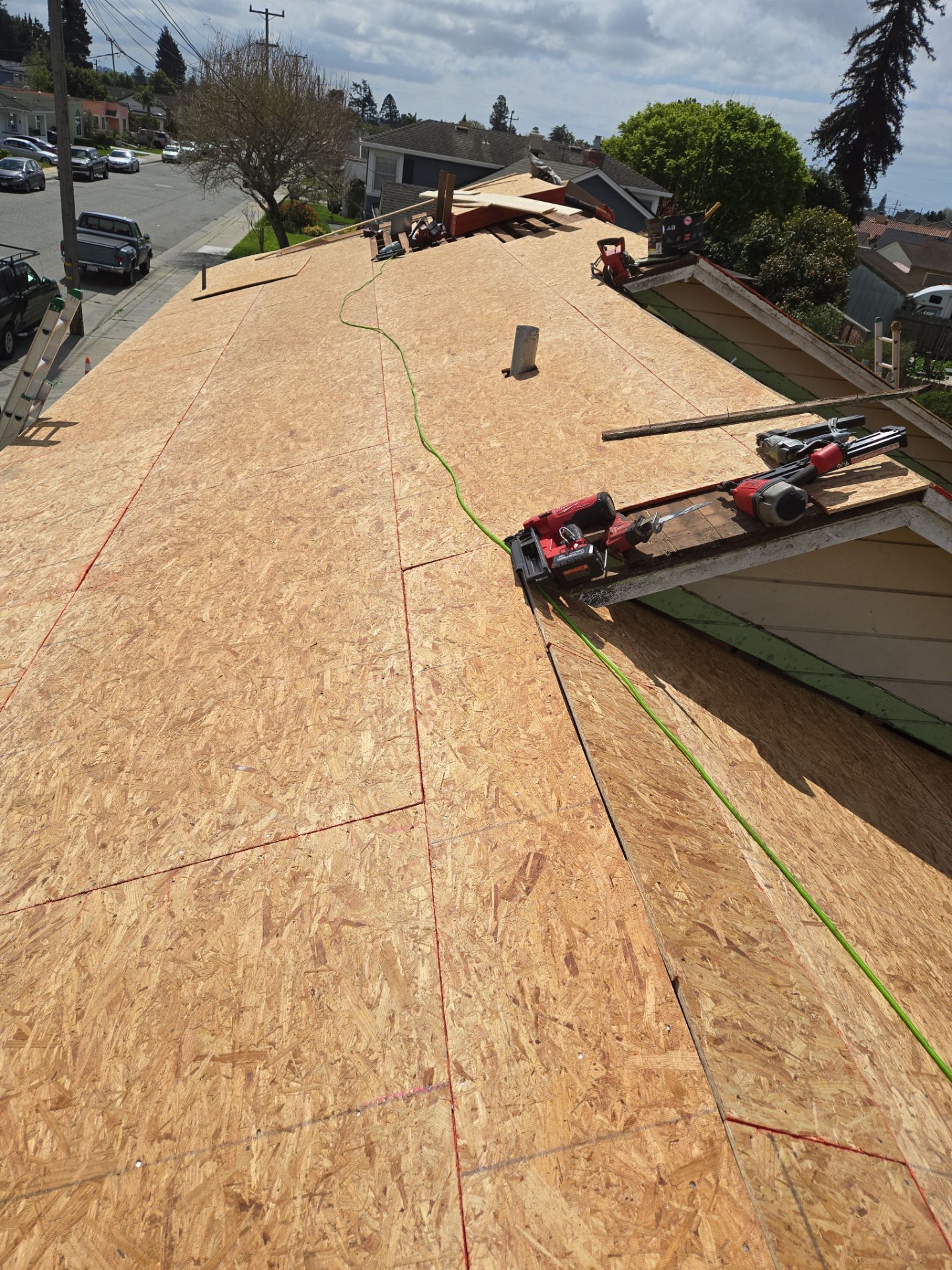 New plywood roof decking installed during the insurance-approved roof replacement